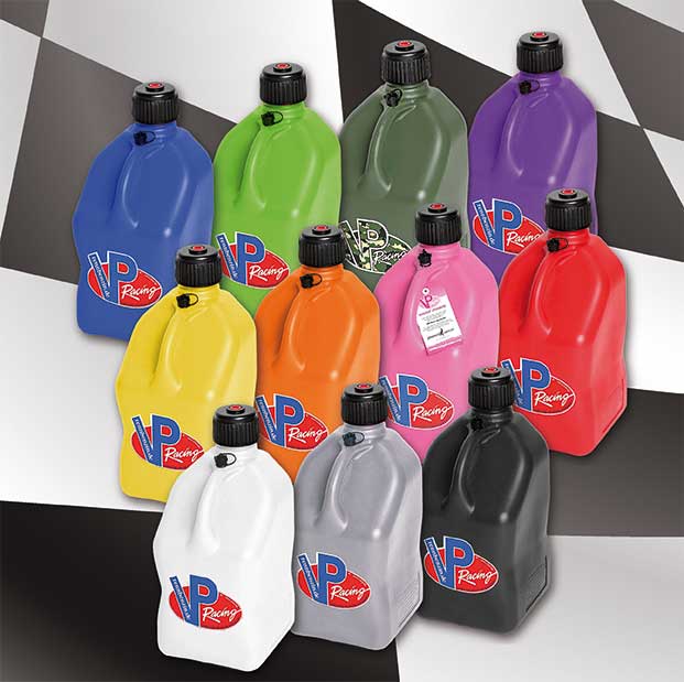 Several colorful VP Racing fuel containers with black caps are arranged against a black-and-white background. The containers are shown in blue, green, olive green, purple, yellow, orange, pink, red, white, gray, and black.